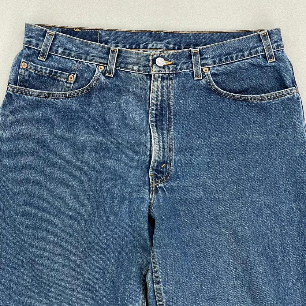 VTG Levi's Jeans 550 Mens 38x32‎ Blue Distressed Denim Relaxed made in USA Cut